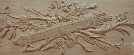 Trophée en bois sur le thème de 'La chasse' bois sculpté